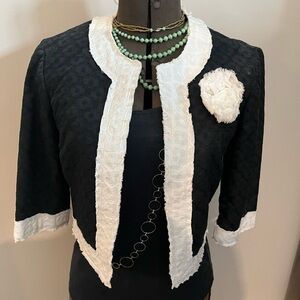 Trina Turk Black Cropped Blazer with White Bouclé Trim and Flower